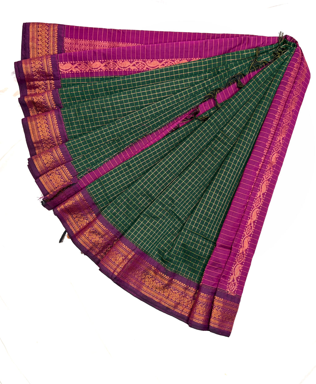 Green and purple saree with gold border on a white background