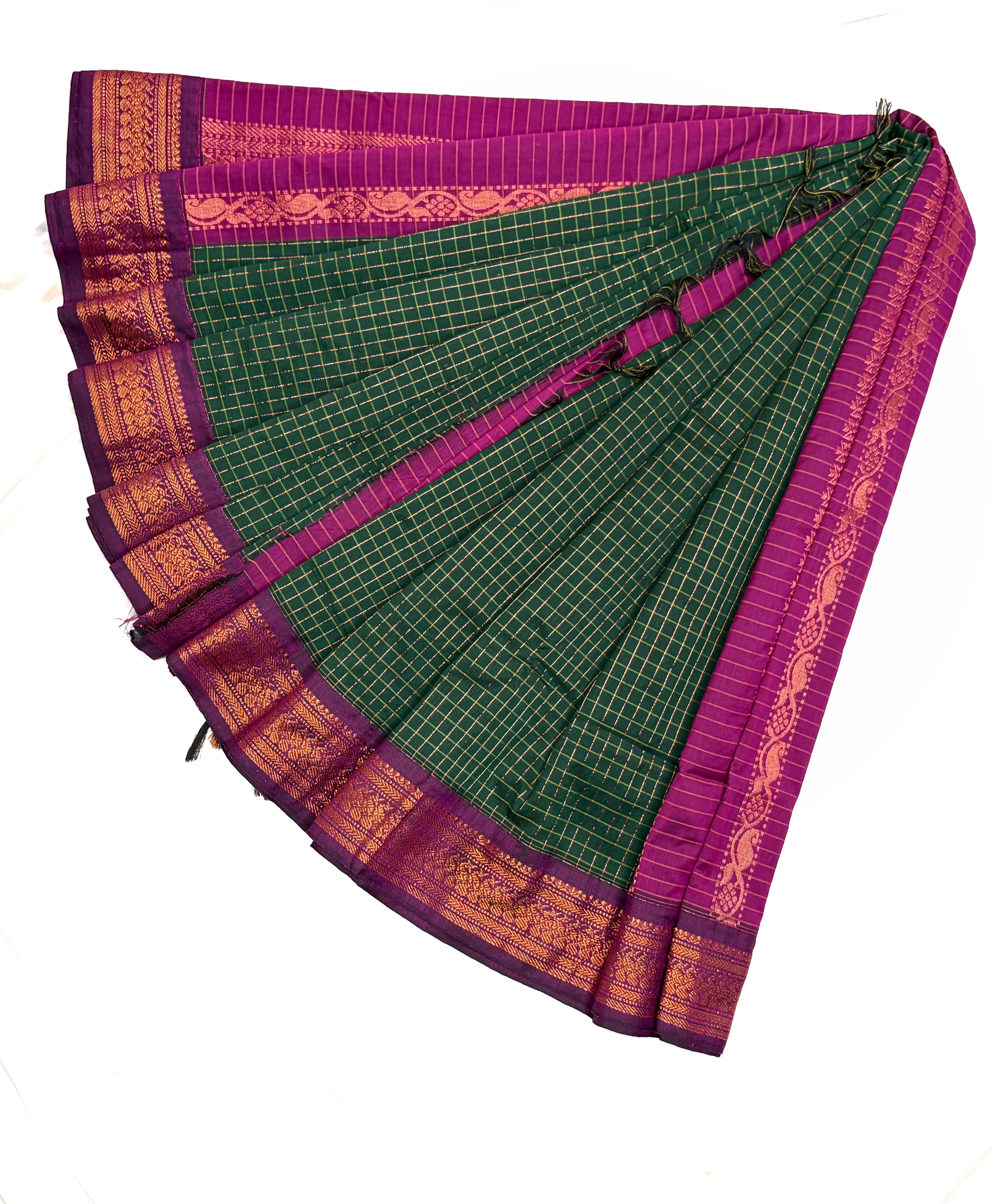 Green and purple saree with gold border on a white background