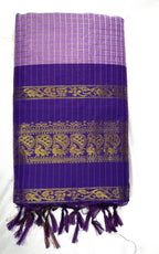 lanveder fabric with gold patterns and tassels on a white background