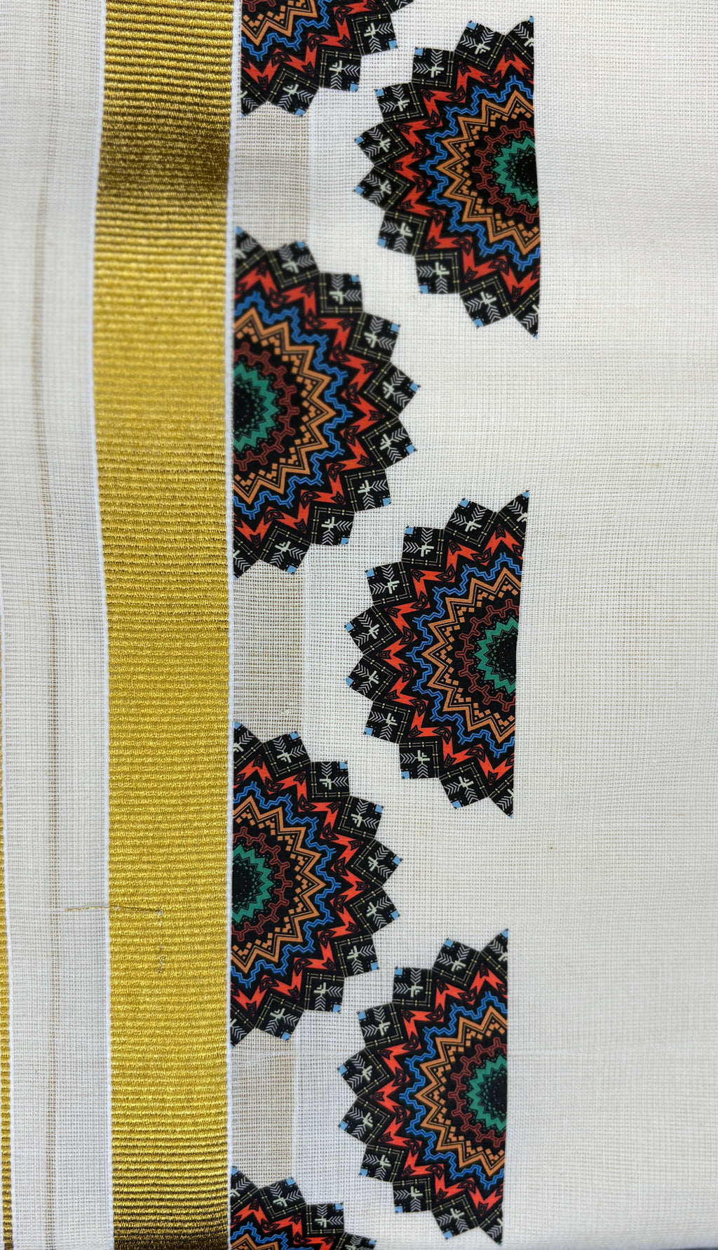 Kerala Kasavu Dhoti with Theyyam Chakra Design