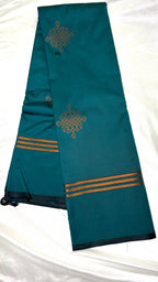 Teal green soft silk saree with traditional kolam zari motifs and zari border South Indian silk saree for weddings and festive wear