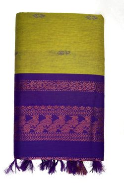 Purple and green fabric with intricate patterns on a white background