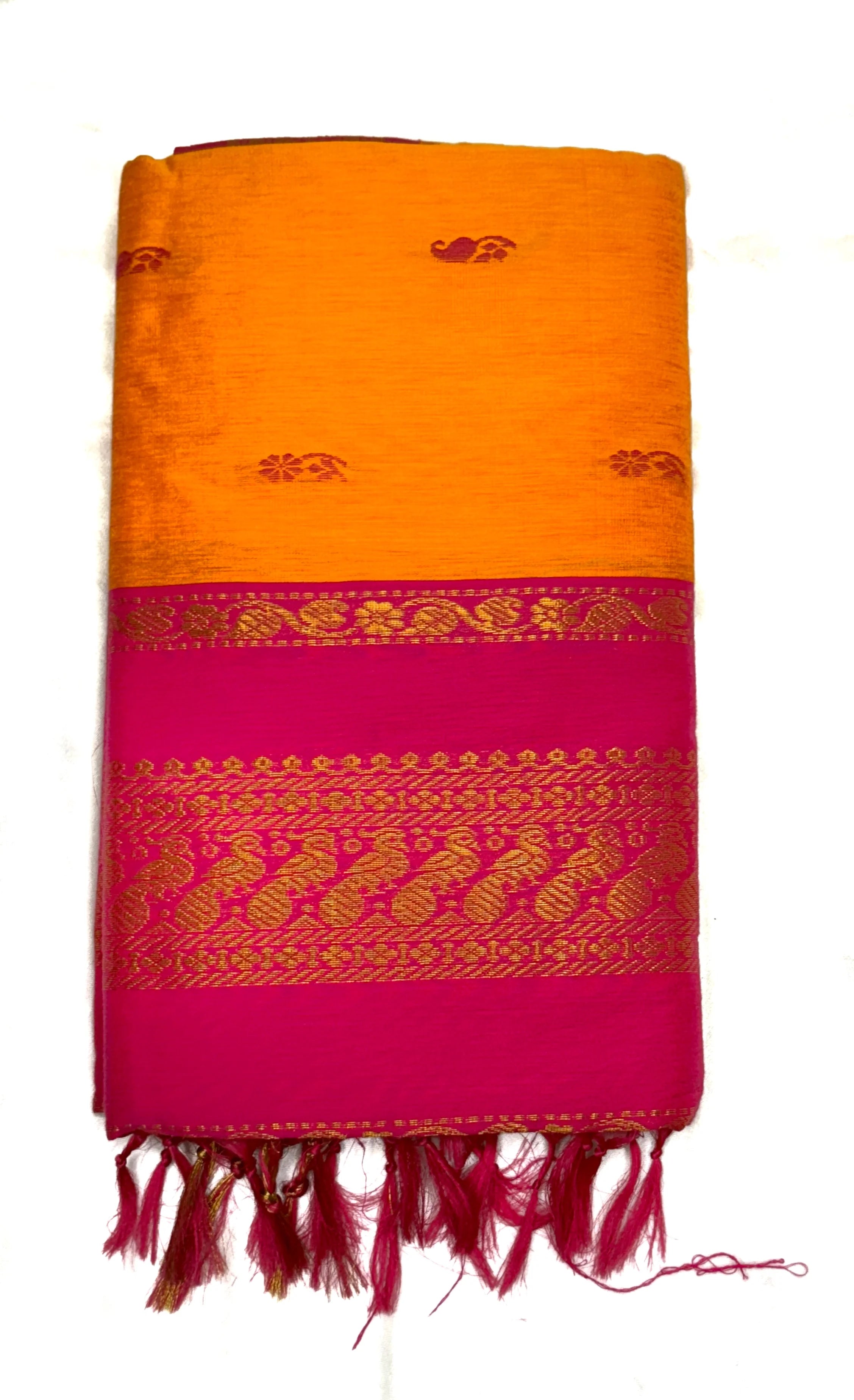 Saree with orange and pink pattern on a white background