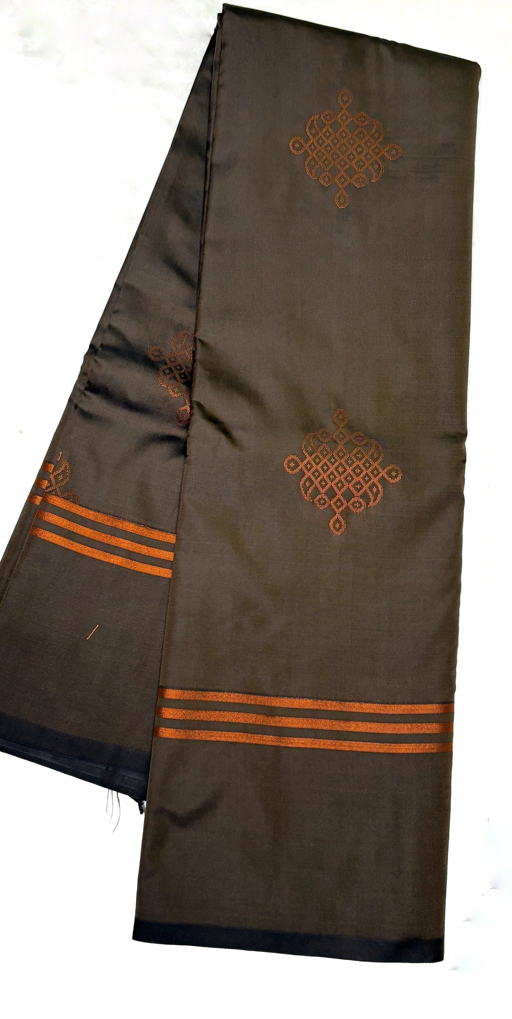 Brown saree with orange patterns on a white background