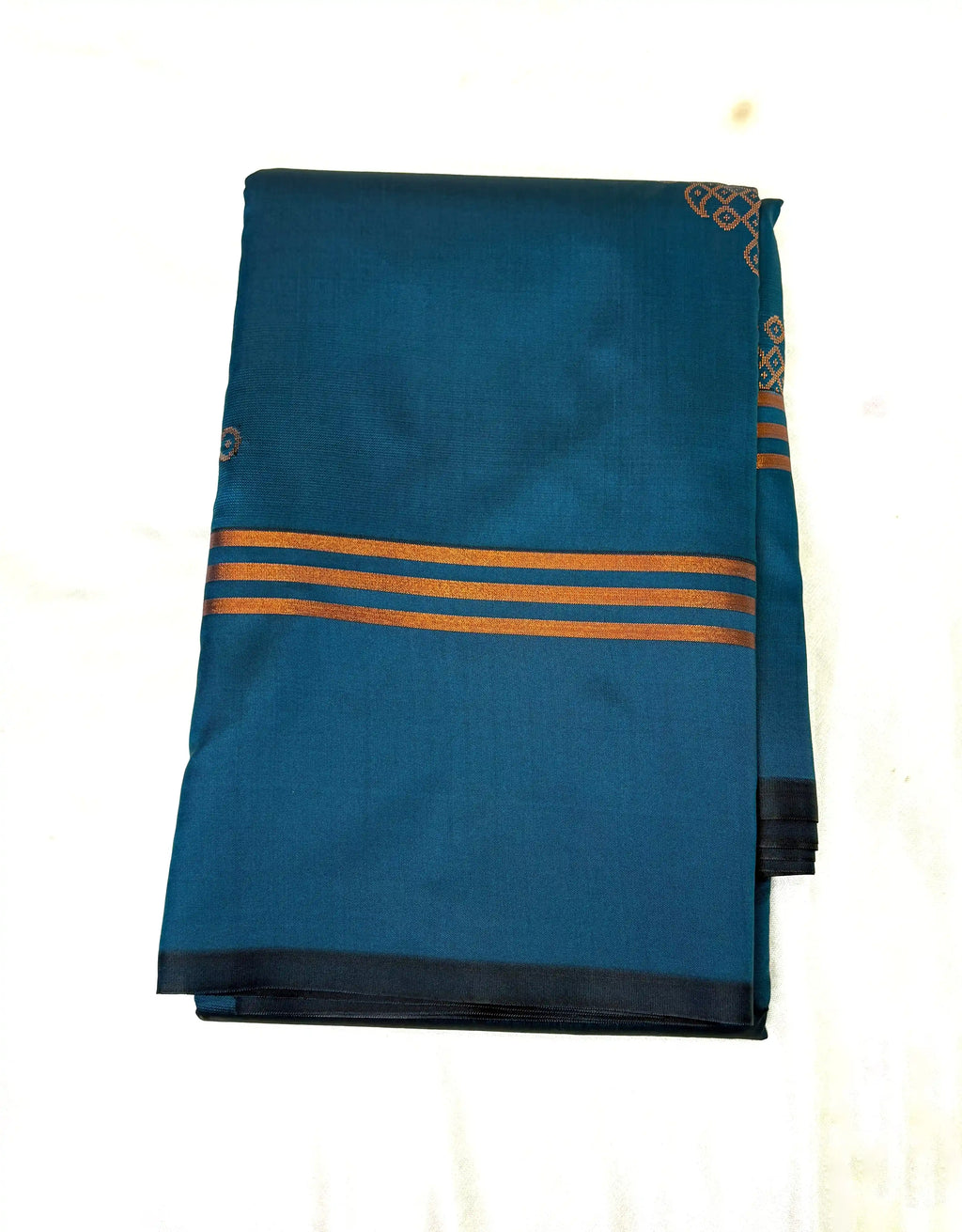 Blue saree with gold stripes on a white background