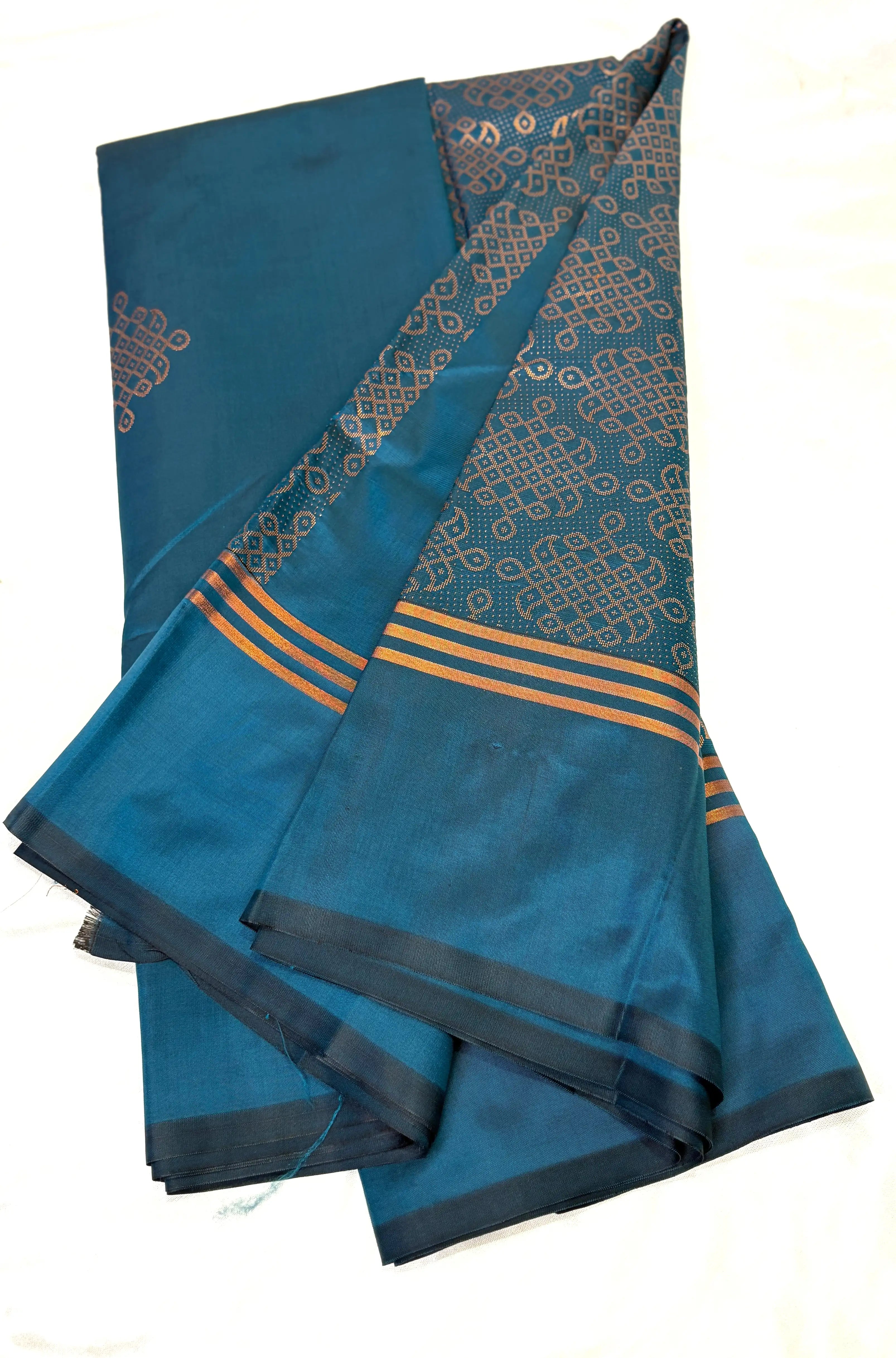 Peacock green soft silk saree with kolam zari motifs and traditional zari border South Indian silk saree for weddings and festive wear
