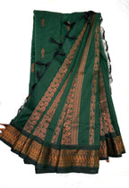 Green saree with brown border on a white background