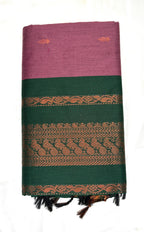 Woven fabric with purple and green stripes and decorative patterns on a white background